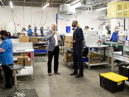 On Oct 30, 2020, the Honorable Ahmed Hussen (MP York South-Weston) toured dynaCERT's Toronto assembly plant and learned about HydraGEN™ Technology from DYA COO & Chief Engineer Robert Maier 21272 on oct 30 2020 the honorable ahmed hussen (mp york 3